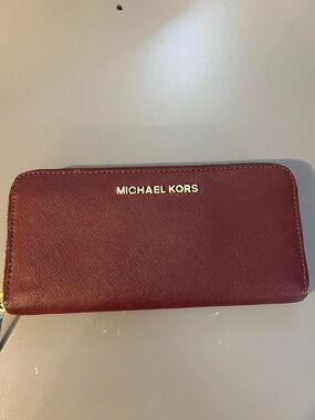 Michael Kors Burgundy Zip-Around Saffiano Wallet with Gold Logo